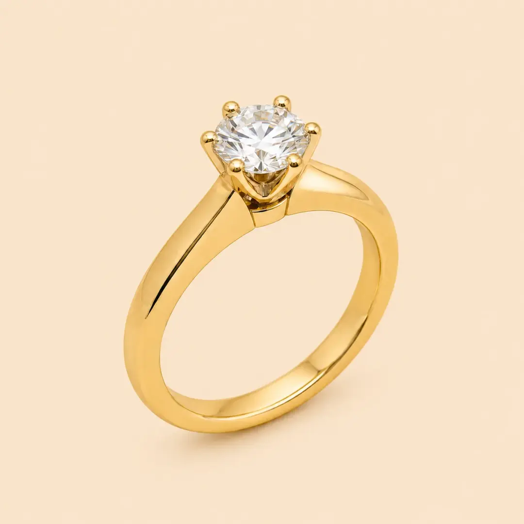 Anillo solitario en oro 18K con piedra, uno de los premios del sorteo